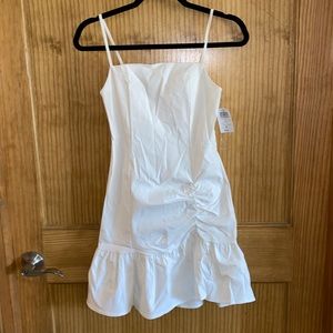 White, fitted with ruffled bottom Windsor dress, tags on.